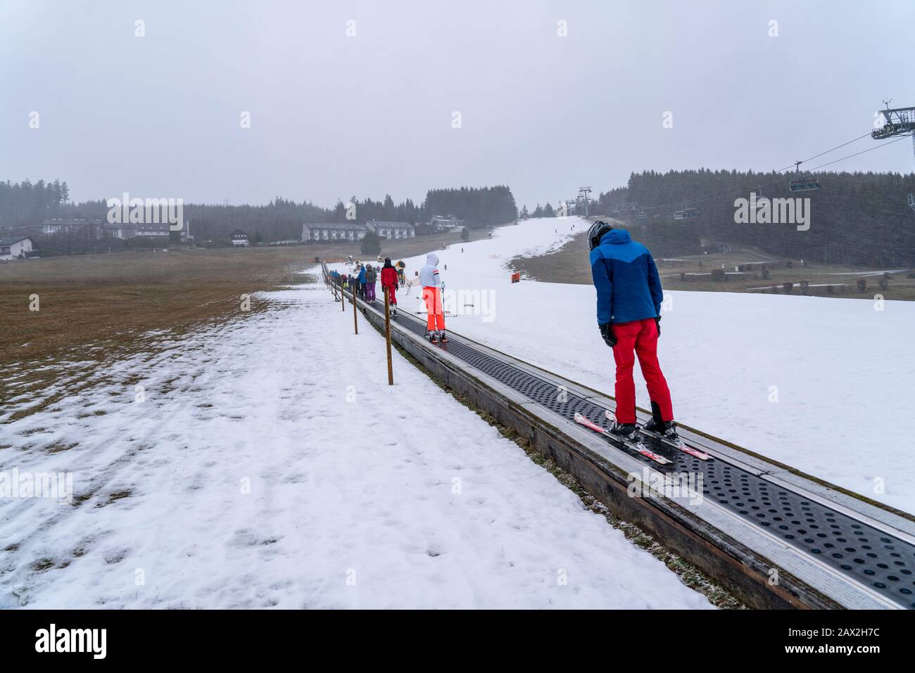 Conveyor belt ski lift, beginners ski area Ritzhagen, operated with ...