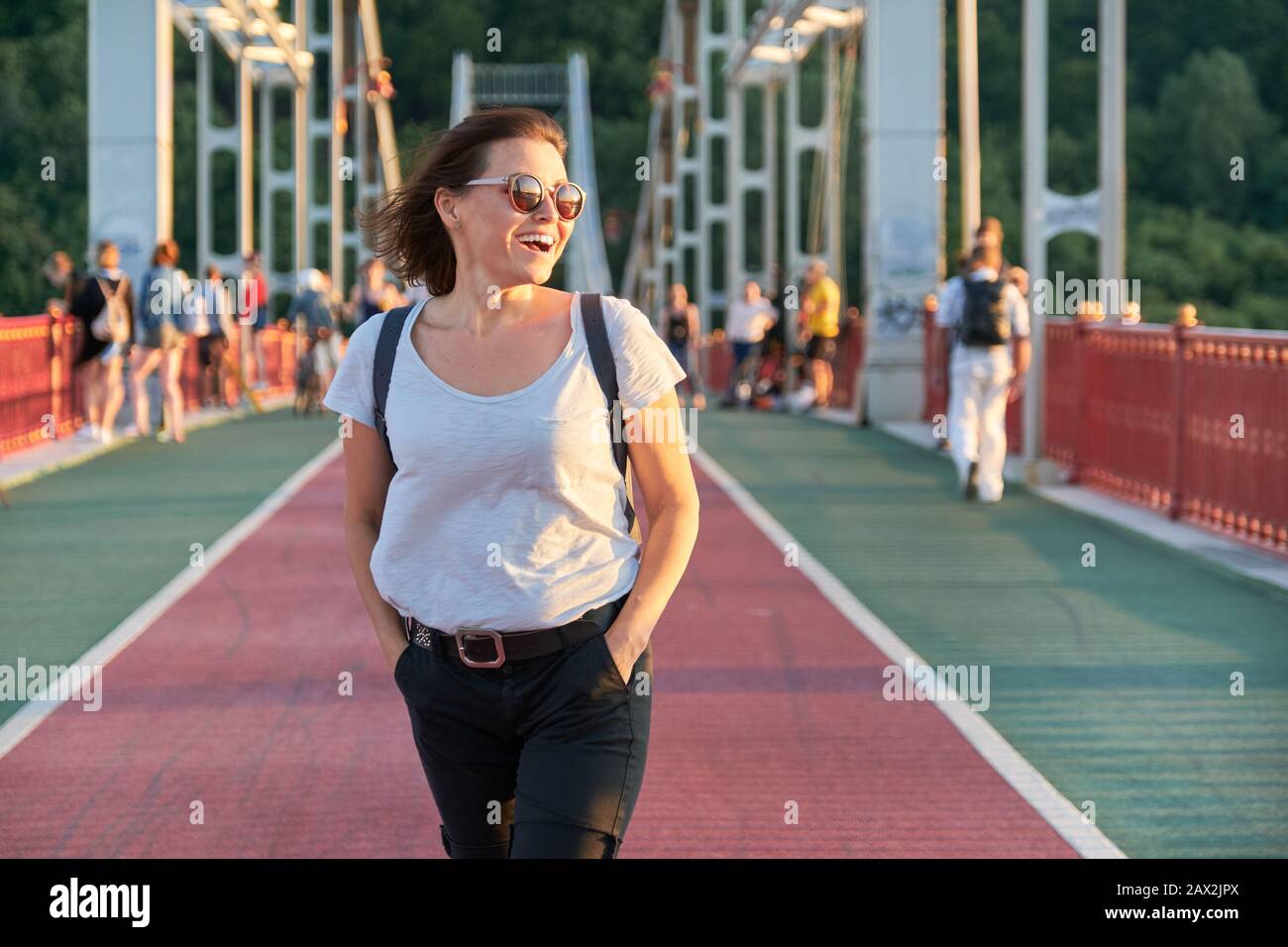 Elegant older woman walking hi-res stock photography and images - Alamy