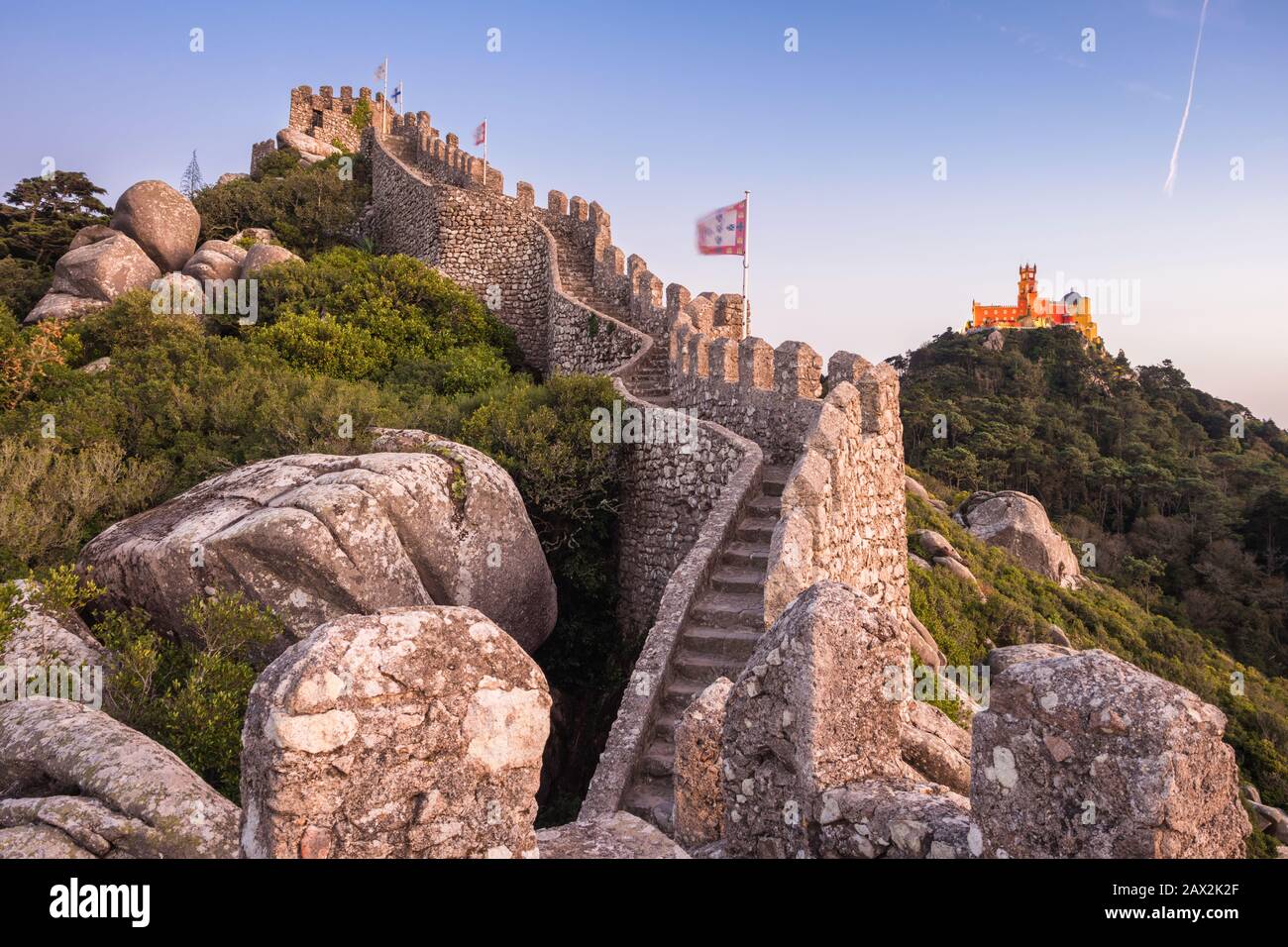 Moorish Castle and Pena Palace at sunset in Sintra, Portugal. Stock Photo
