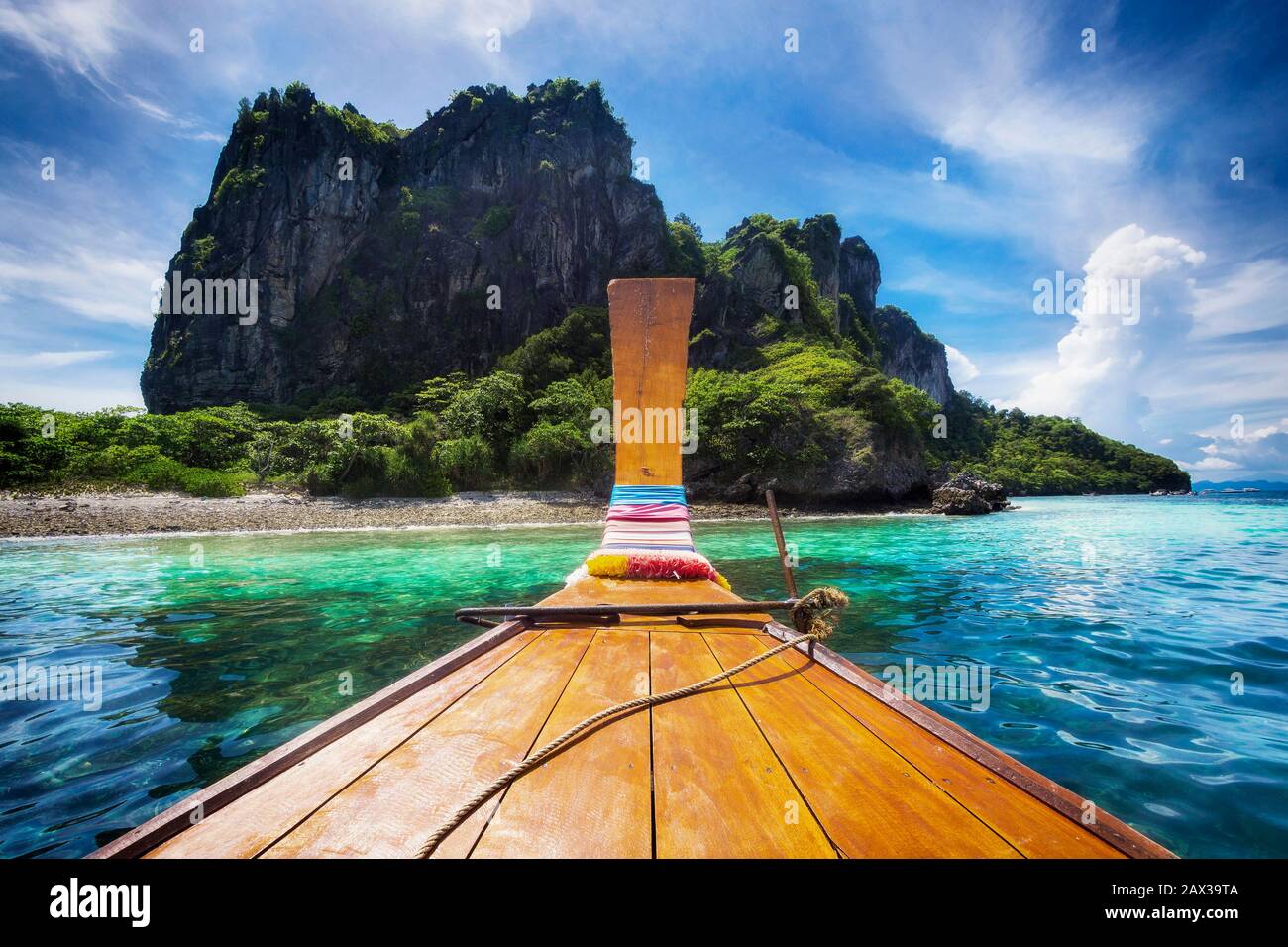 Traditional long tail boat on the way to Maya Bay on Koh Phi Phi Island, Krabi, Southern Thailand. Stock Photo