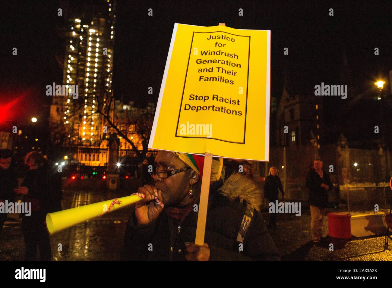 London, UK. 10th Feb 2020. A protester in Westminster during demonstration against deportation of 50 people on a Home Office charter flight to Jamaica. Credit: Thabo Jaiyesimi/Alamy Live News Stock Photo