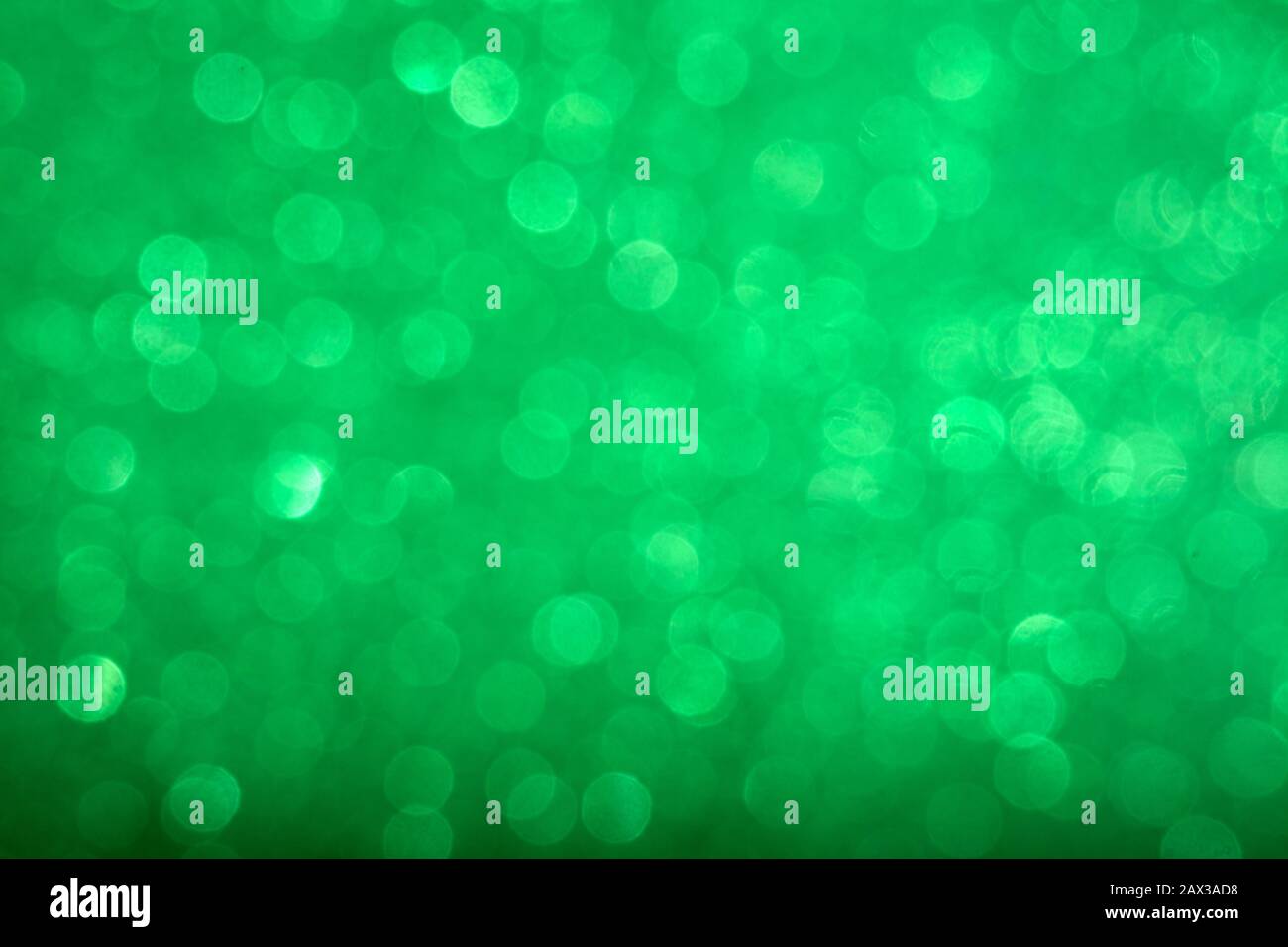 Abstract shiny circular green bokeh background. Spring Stock Photo
