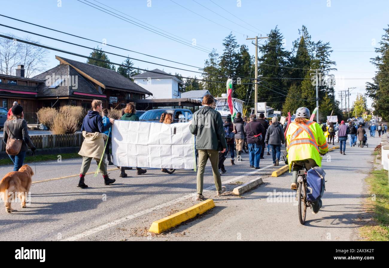 Activists and protesters block an intersection in Tofino, BC, Canada to protest the government and the Coastal GasLink pipeline project Stock Photo