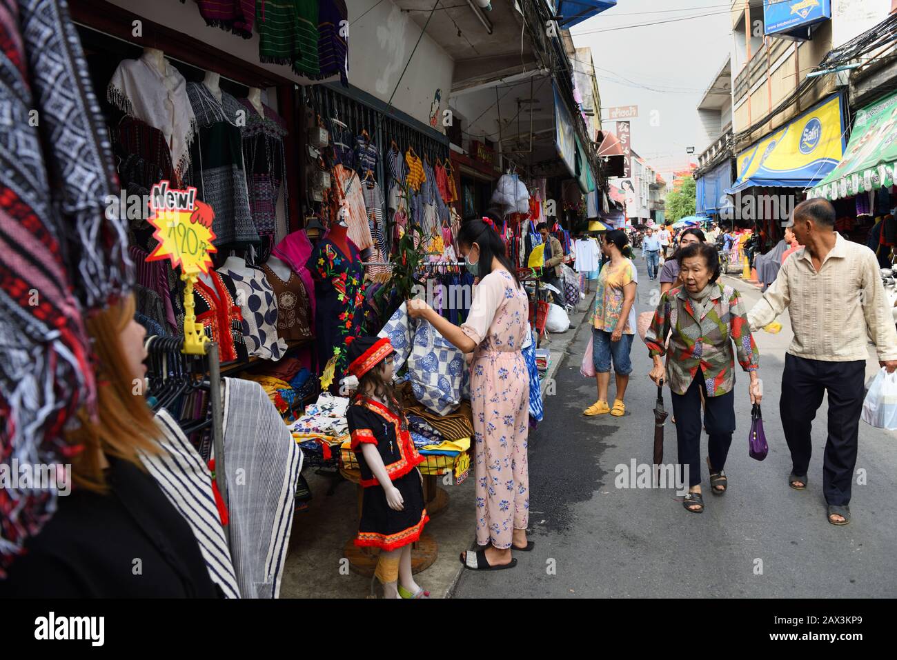 People browsing at an outdoor market, Chiang Mai, Thailand Stock Photo