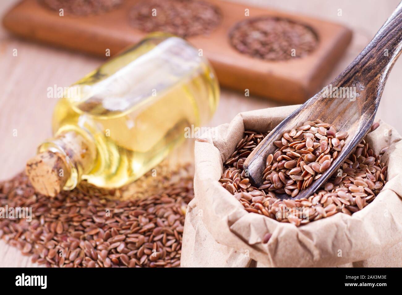 seeds and linseed oil on the table Stock Photo Alamy