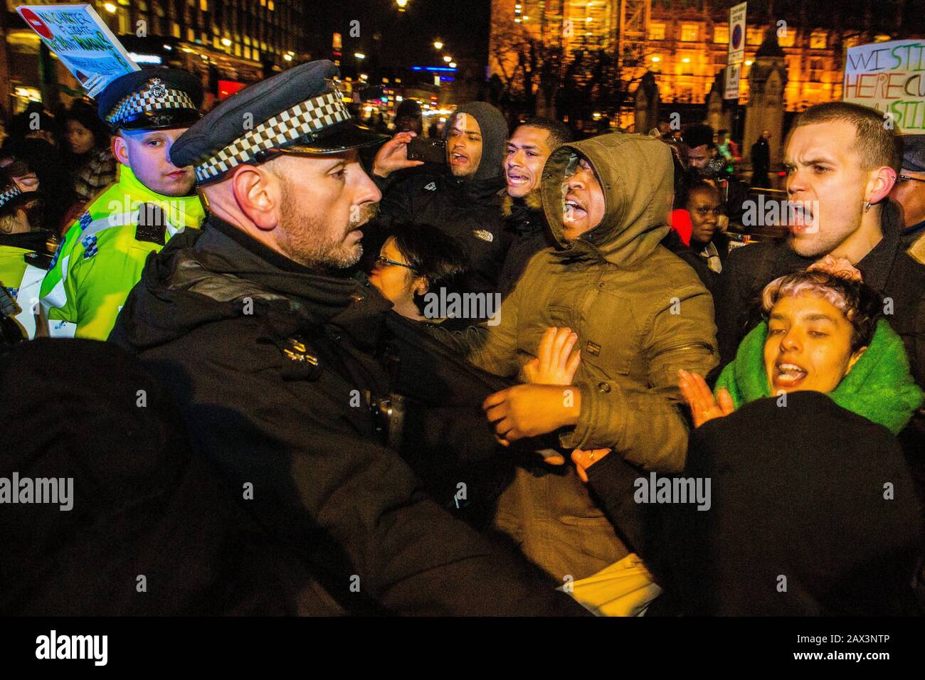London UK 1Oth Feb 2020 Police clash with protesters outside the houses of parliament during demonstration against deportation of 50 people on a Home Office charter flight to Jamaica. Credit: Thabo Jaiyesimi/Alamy Live News Stock Photo