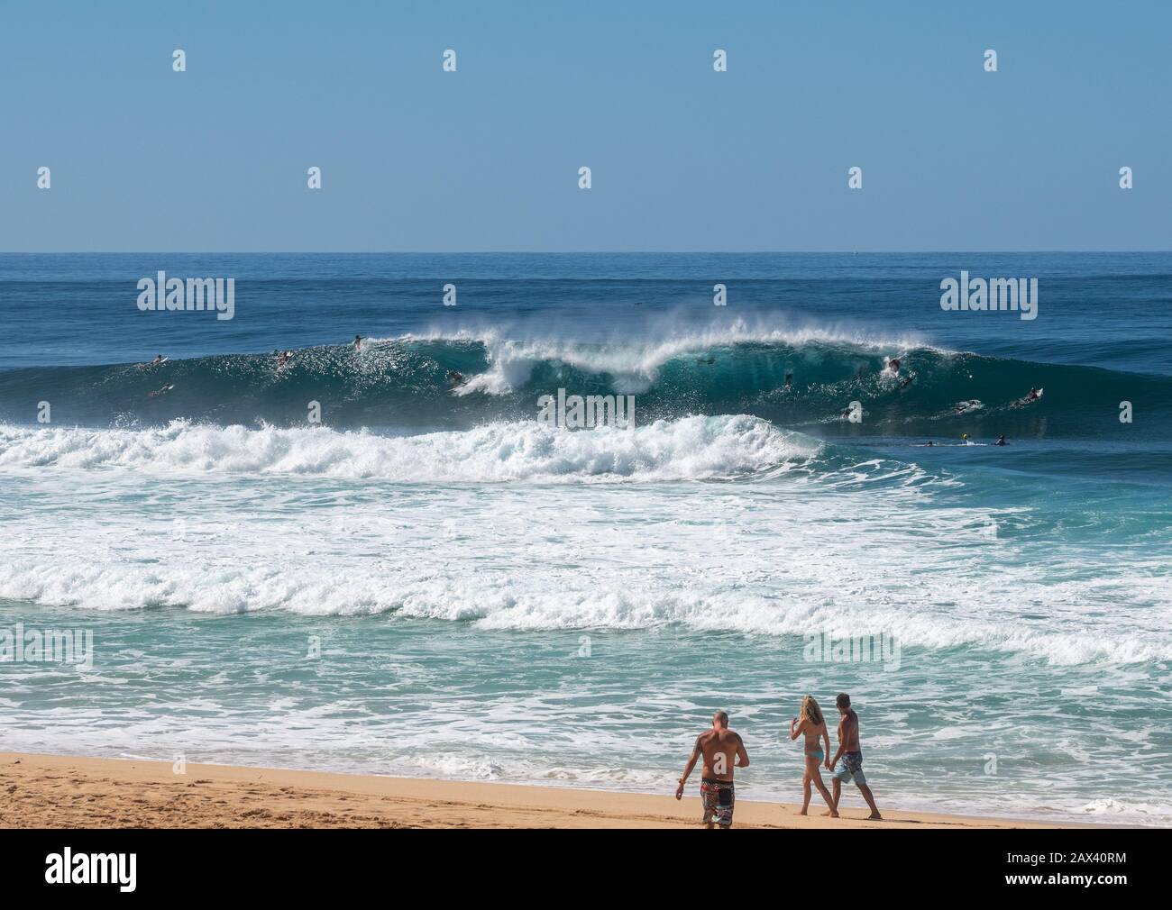Surfer inside a big wave in the sea at Banzai Pipeline on north coast