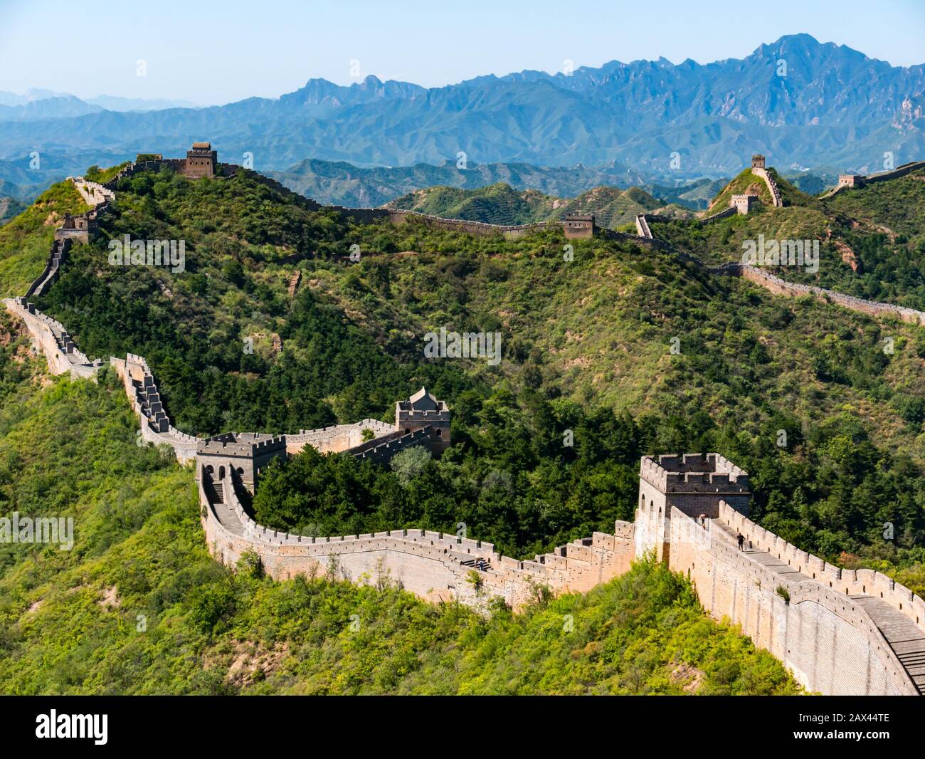 Ming dynasty Jinshanling Great Wall of China with watch towers on mountain ridge in sunny weather, Hebei Province, China, Asia Stock Photo