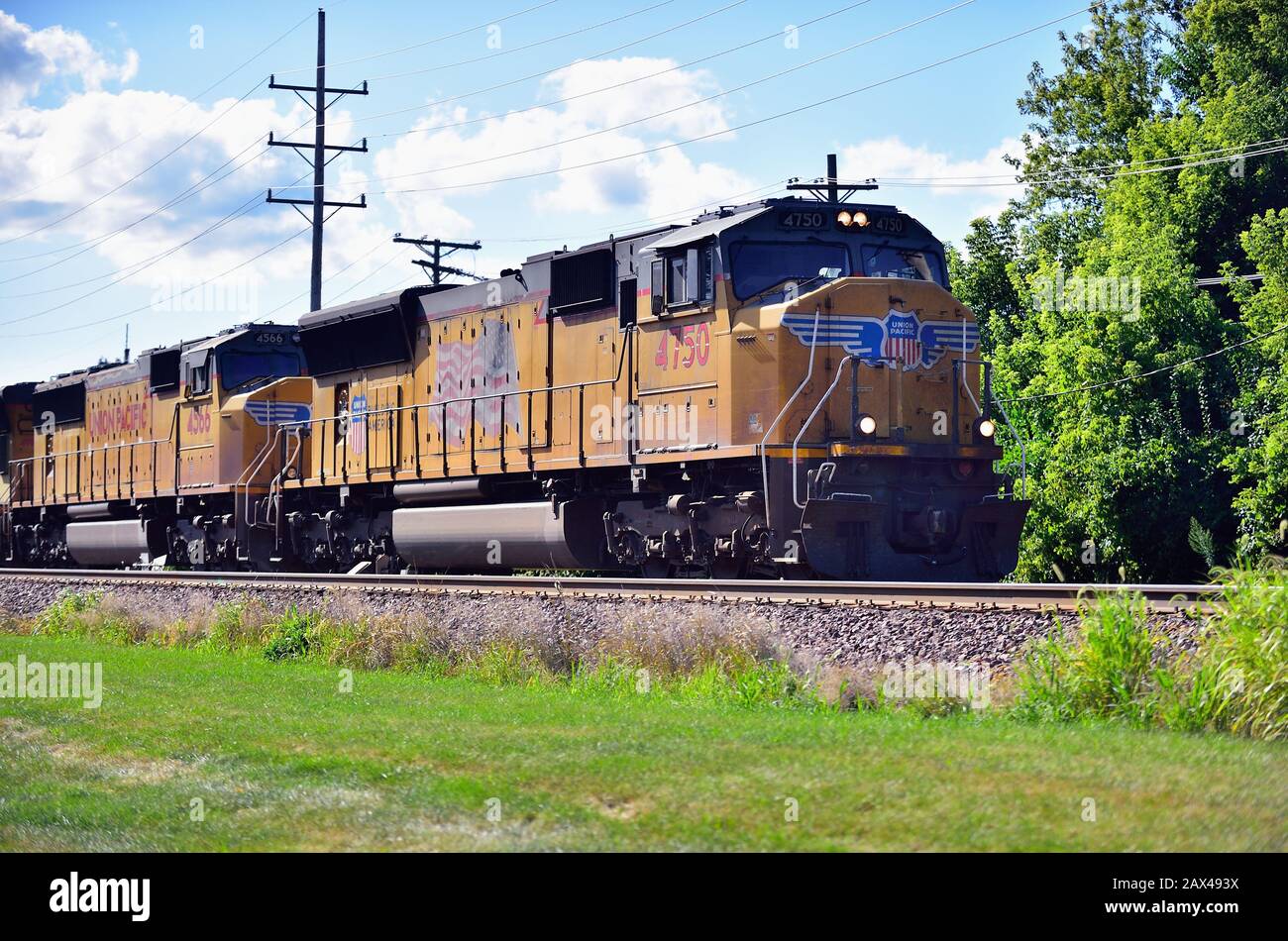 Geneva, Illinois, USA. A Union Pacific freight train, lead by three