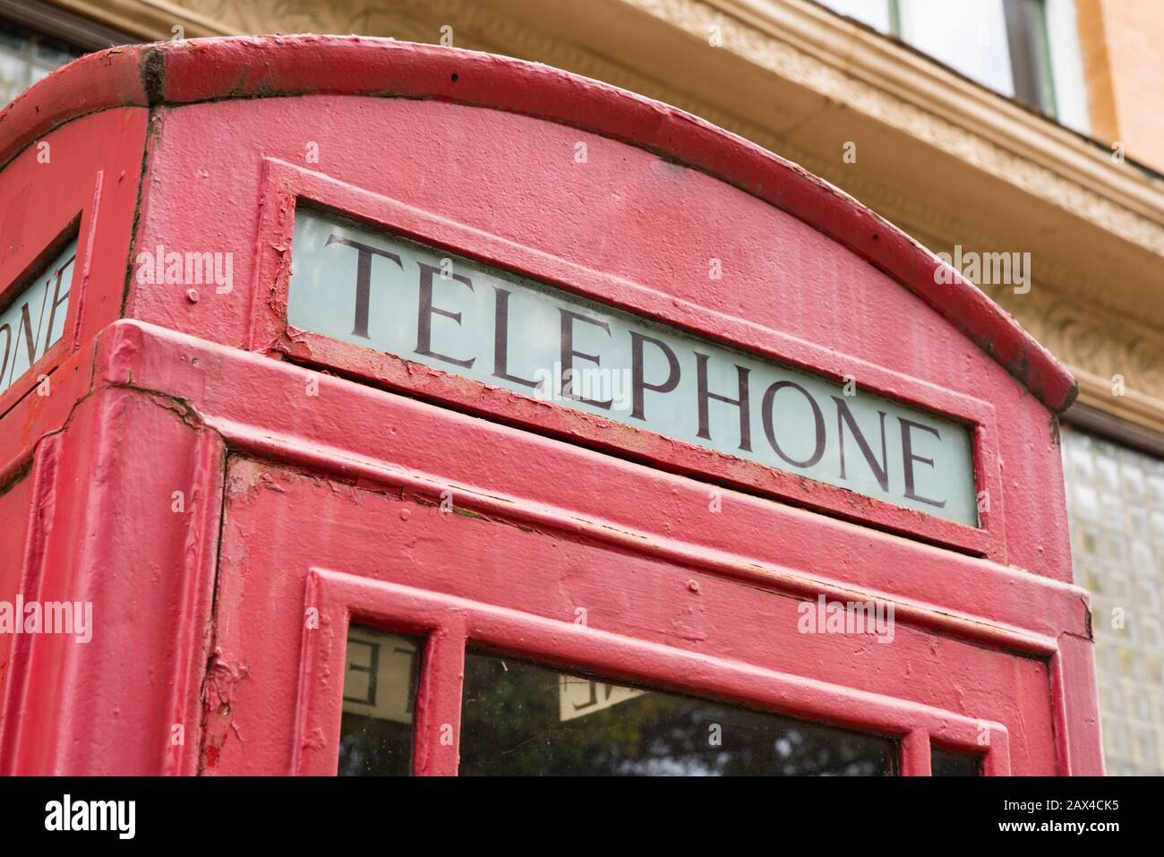 Old red British retro style telephone booth Stock Photo Alamy
