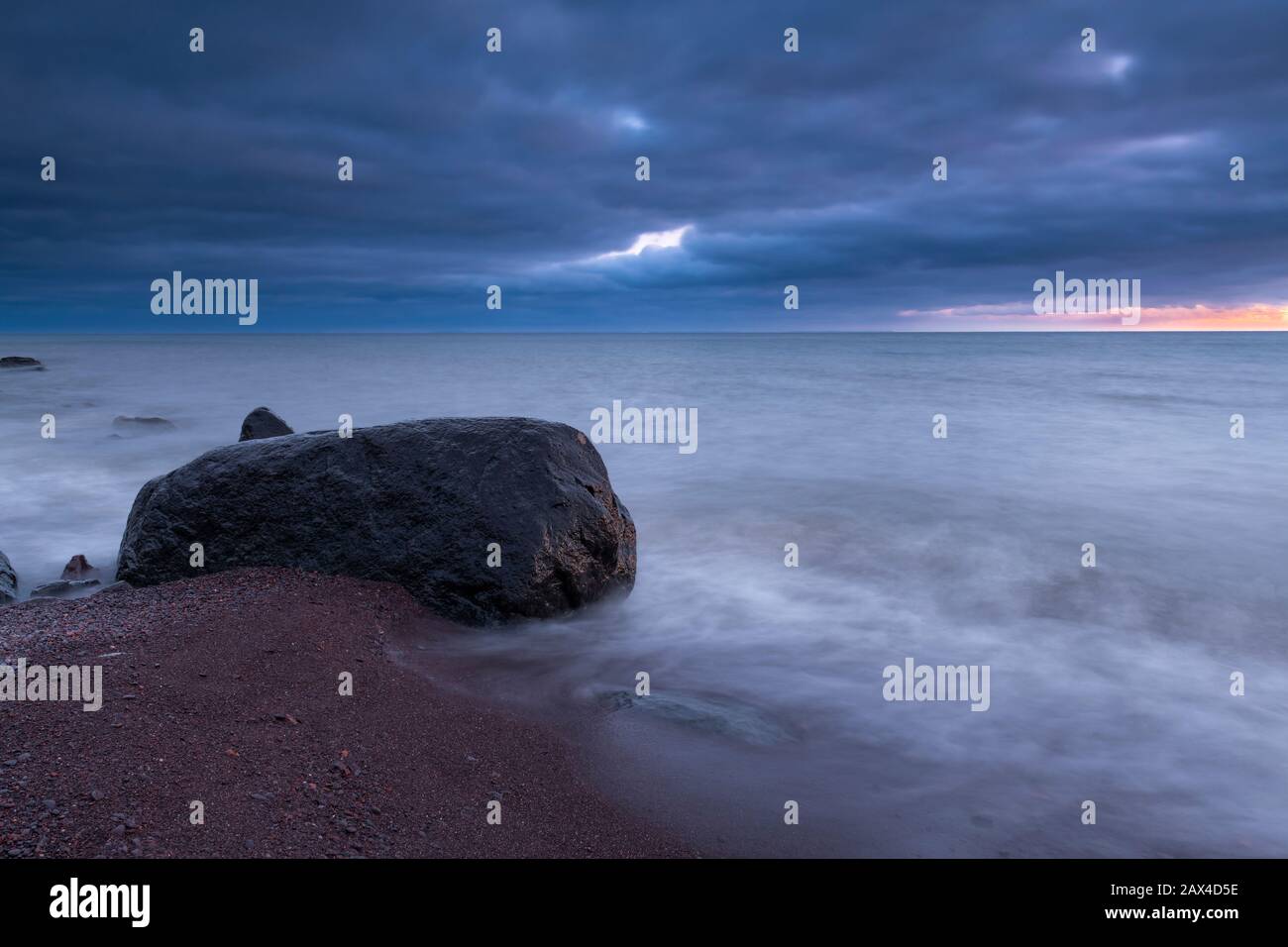 Sunset over Lake Superior, January, near Two Harbors, MN, USA, by Dominique Braud/Dembinsky Photo Assoc Stock Photo