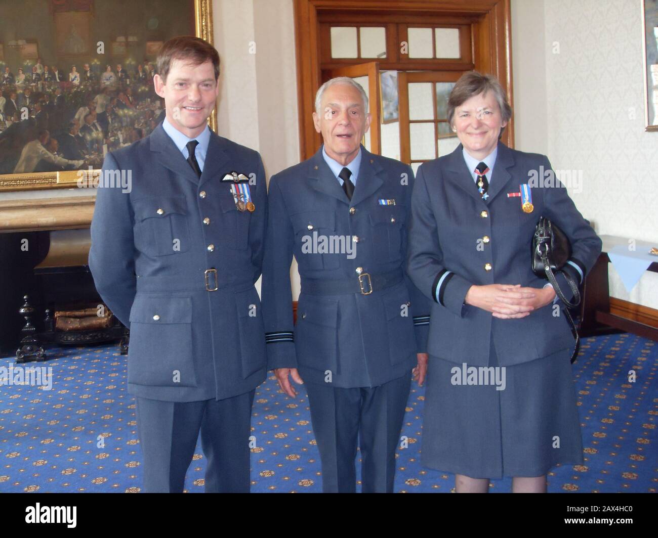'English: Air Commodore Ian Stewart RAF, Flt Lt A.R.T. Bennett RAF VR(T) and Air Commodore Barbara Cooper RAF at RAFC Cranwell Other Versions Air Cmdr Barbara Cooper.jpg; 3 June 2010 (original upload date); Transferred from en.wikipedia to Commons by Sreejithk2000 using CommonsHelper.; Goober alive at English Wikipedia; ' Stock Photo