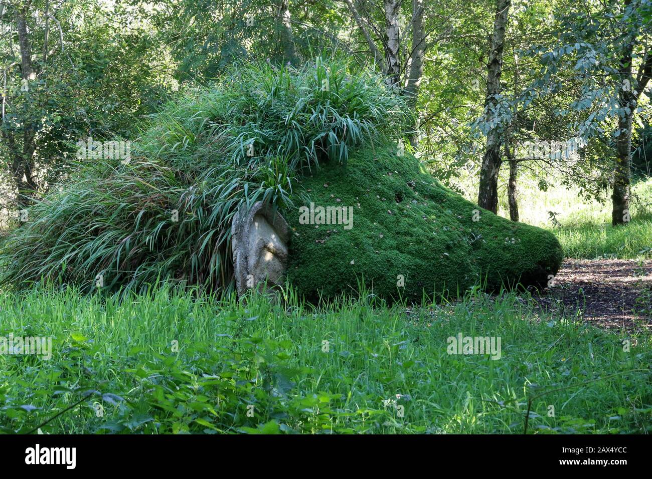 Hedgehog sculpture part of the Oakfield Park sculpture work found on the woodland trail n the award -winning gardens at Oakfield Park, County Donegal.. Stock Photo