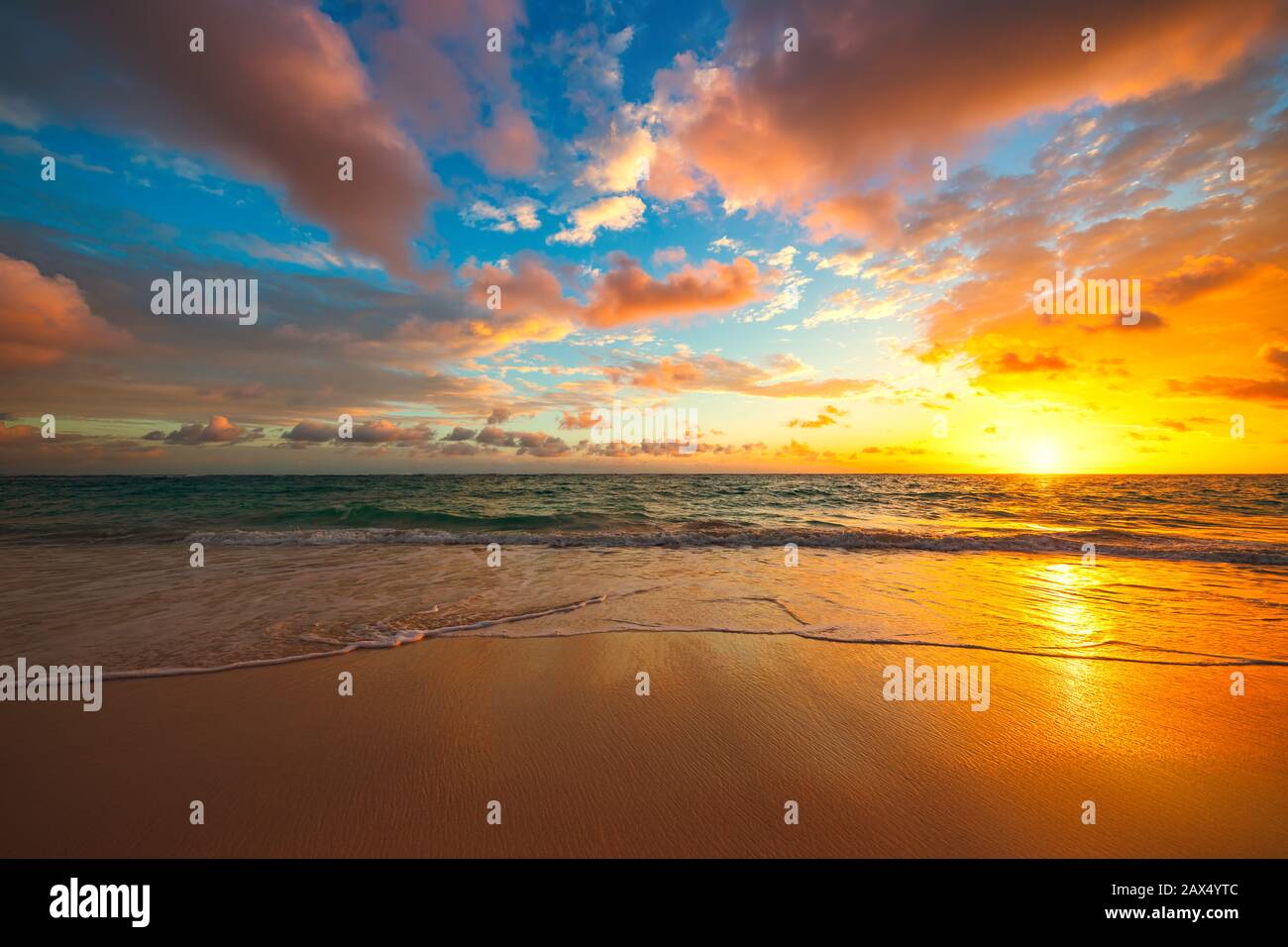 Beach sunrise over the tropical sea Stock Photo - Alamy