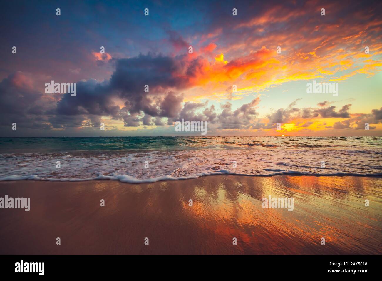 Beach sunrise over the tropical sea Stock Photo - Alamy