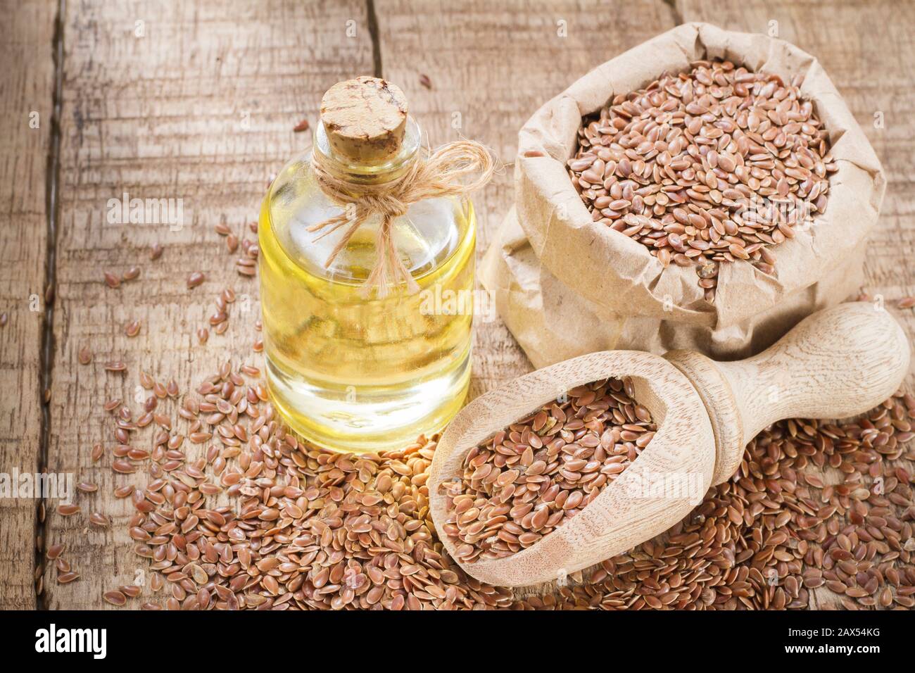 seeds and linseed oil on the table Stock Photo Alamy