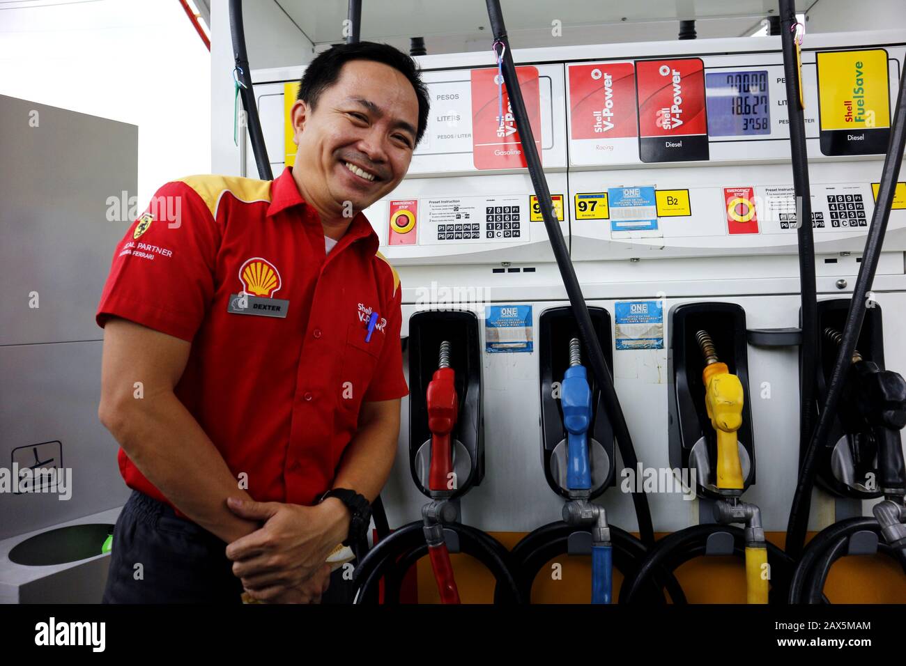 Cainta, Rizal, Philippines February 8, 2020 Gas station employee