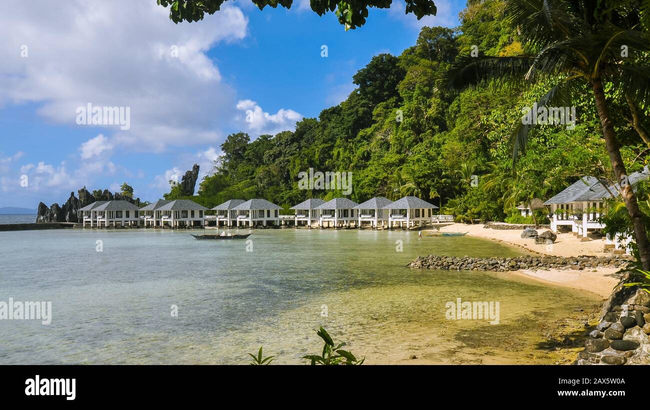 El Nido, Palawan, Philippines - Nov. 19, 2019: Beach cabanas at Lagen Island Resort. Stock Photo