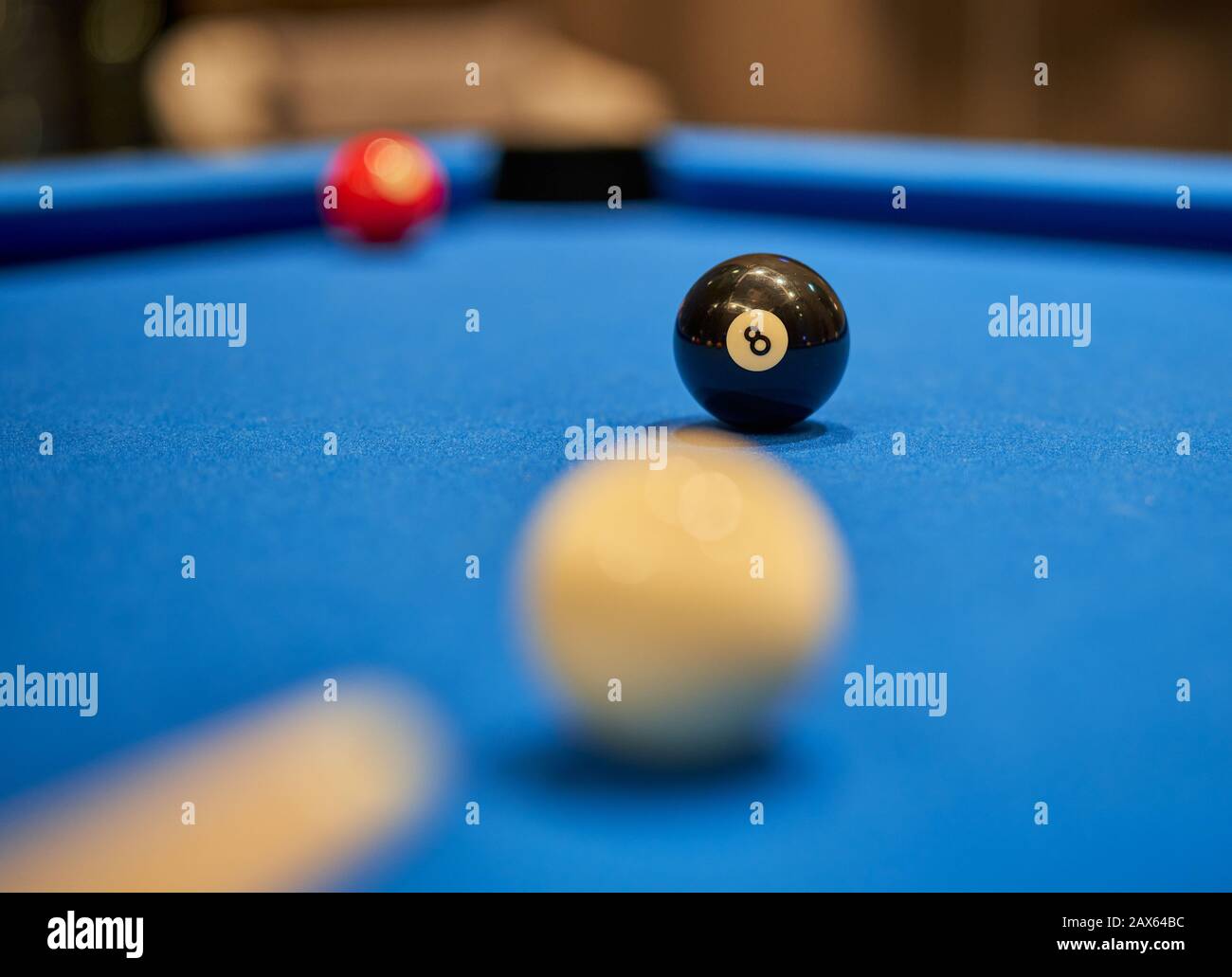 Pool/Billiard/Snooker focusing on the eight-ball. Chance to win the game. Stock Photo