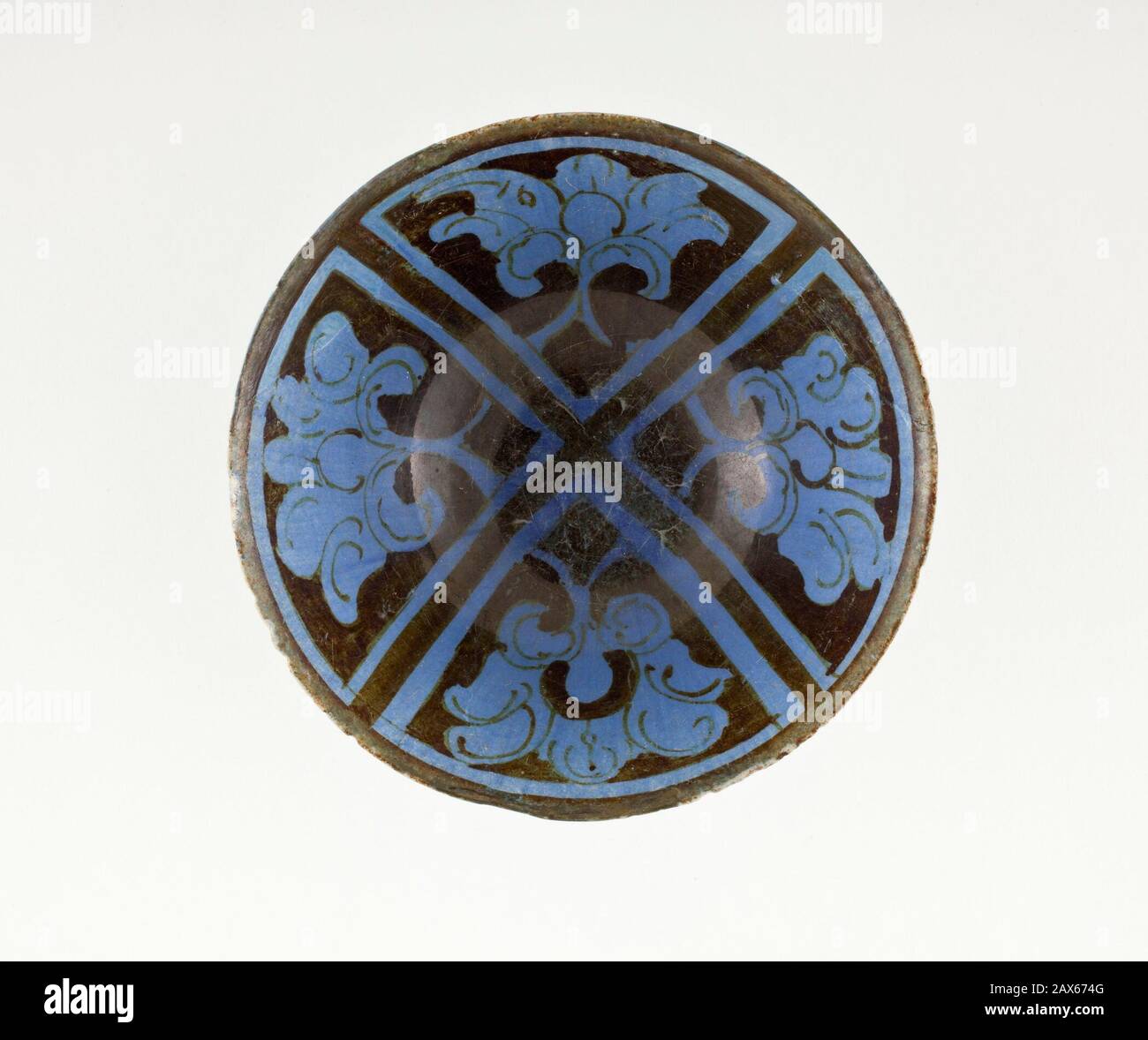 'Bowl; English:  Iran, late 12th-early 13th century Furnishings; Serviceware Fritware, overglaze luster-painted Height:  2 5/8 in. (6.67 cm); Diameter:  5 7/8 in. (14.92 cm) Gift of the Gluck Family in honor of Jay Gluck (M.2003.107) Islamic Art Currently on public view: Ahmanson Building, floor 4; Late 12th-early 13th century; ' Stock Photo