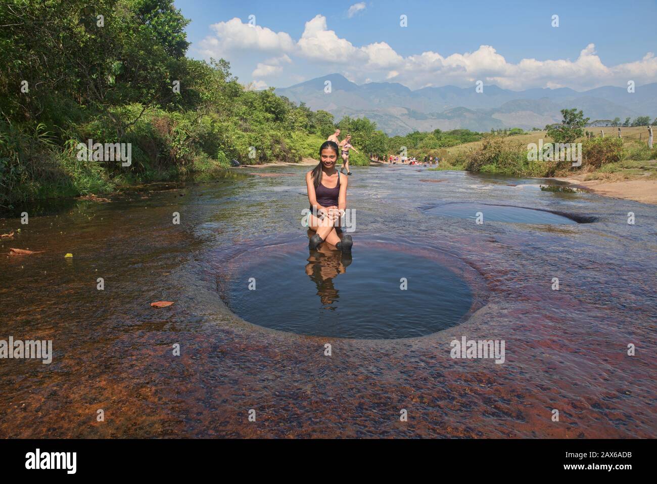 Enjoying the deep natural swimming holes of Las Gachas, Guadalupe,  Santander, Colombia Stock Photo - Alamy