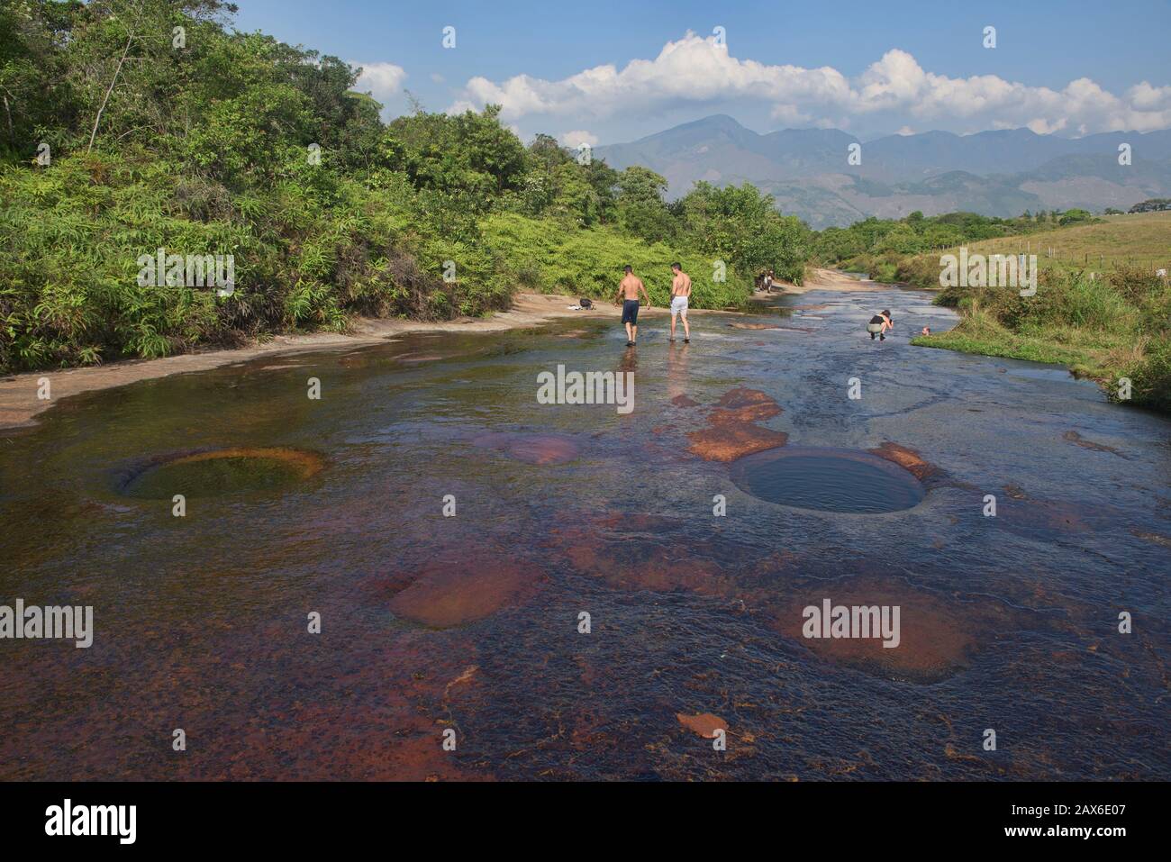 Enjoying the deep natural swimming holes of Las Gachas, Guadalupe