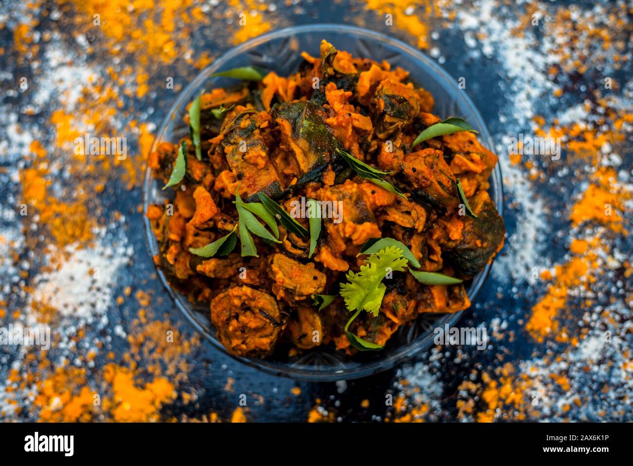 Famous Indian & Gujarati snack dish in a glass plate on wooden surface