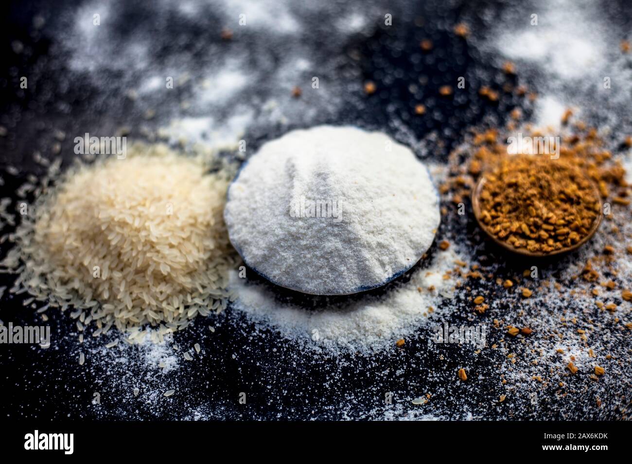 Hair growth remedy of rice flour water and fenugreek seed powder on wooden  surface Stock Photo - Alamy