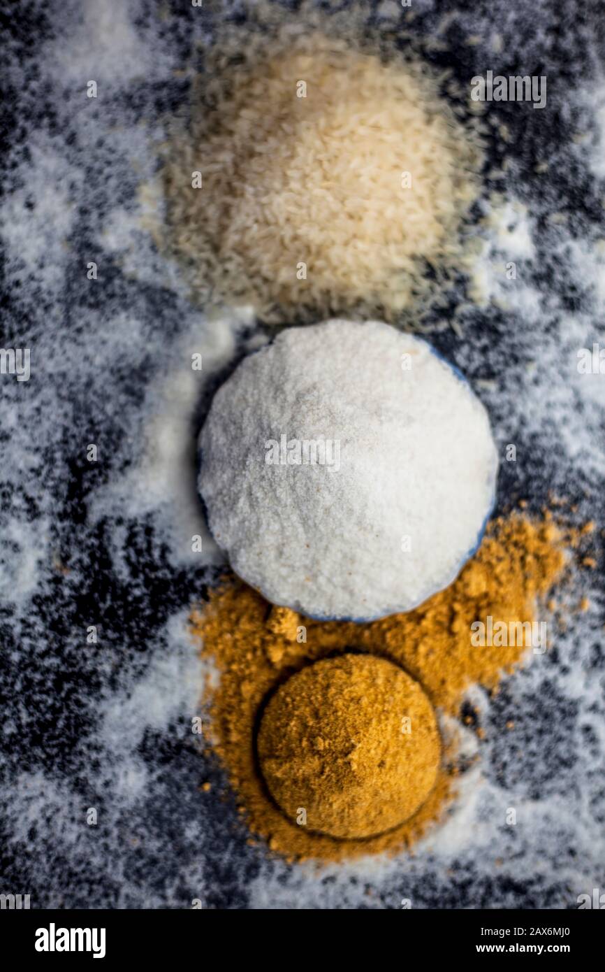 Face mask for glowing skin on wooden surface consisting of rice flour