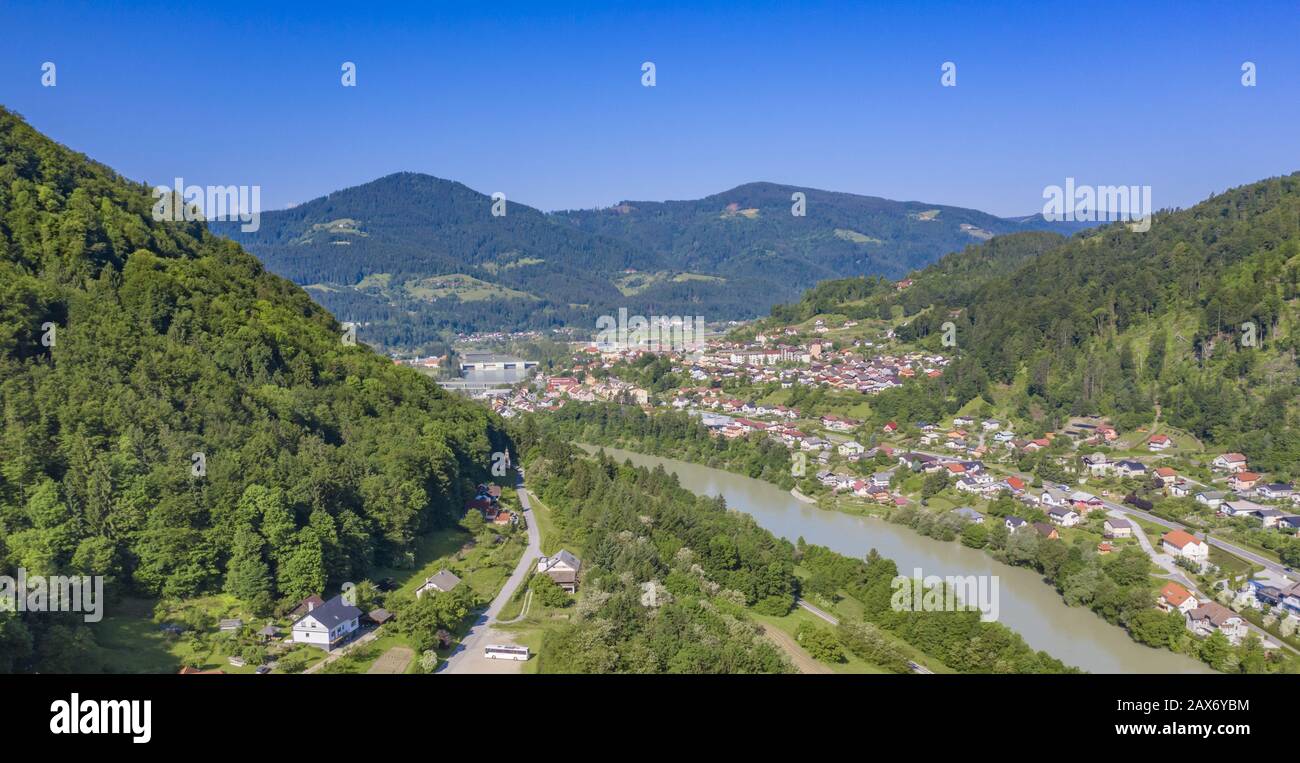 Stunning shot of the town of Dravograd near the Drava river valley in Slovenia Stock Photo