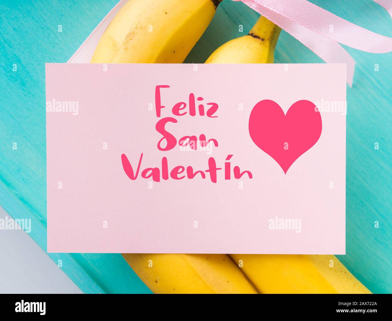 Two bananas. Happy valentines day in Spanish Stock Photo Alamy