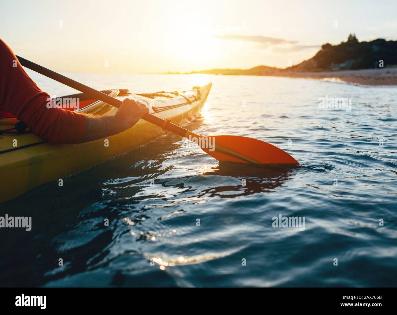 Close up of man holding kayak paddles Stock Photo