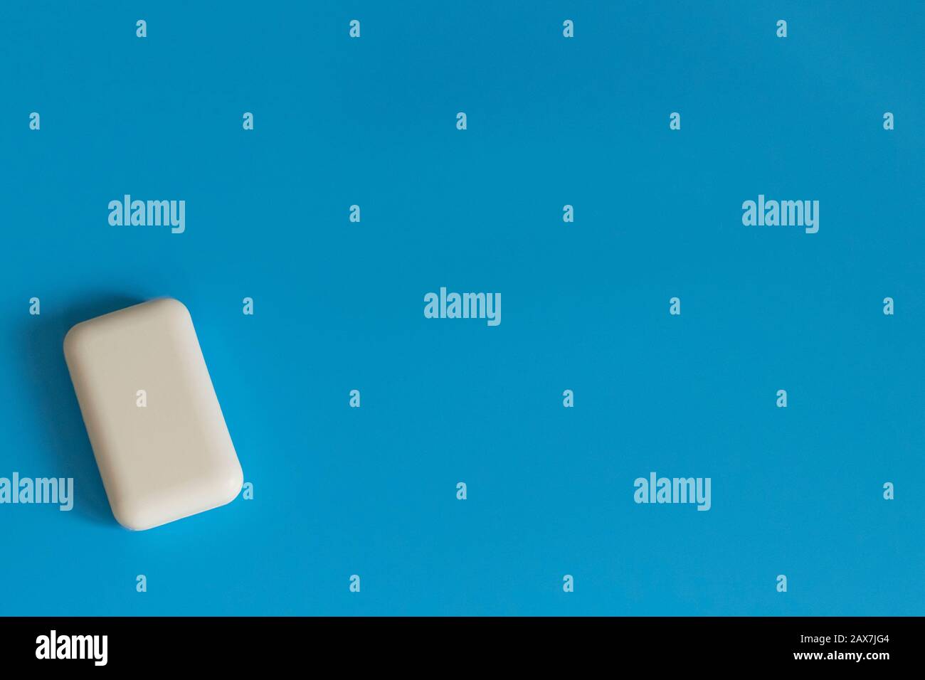 Soap on a blue background. Hygiene and cleanliness. Soap for bath, laundry and body care