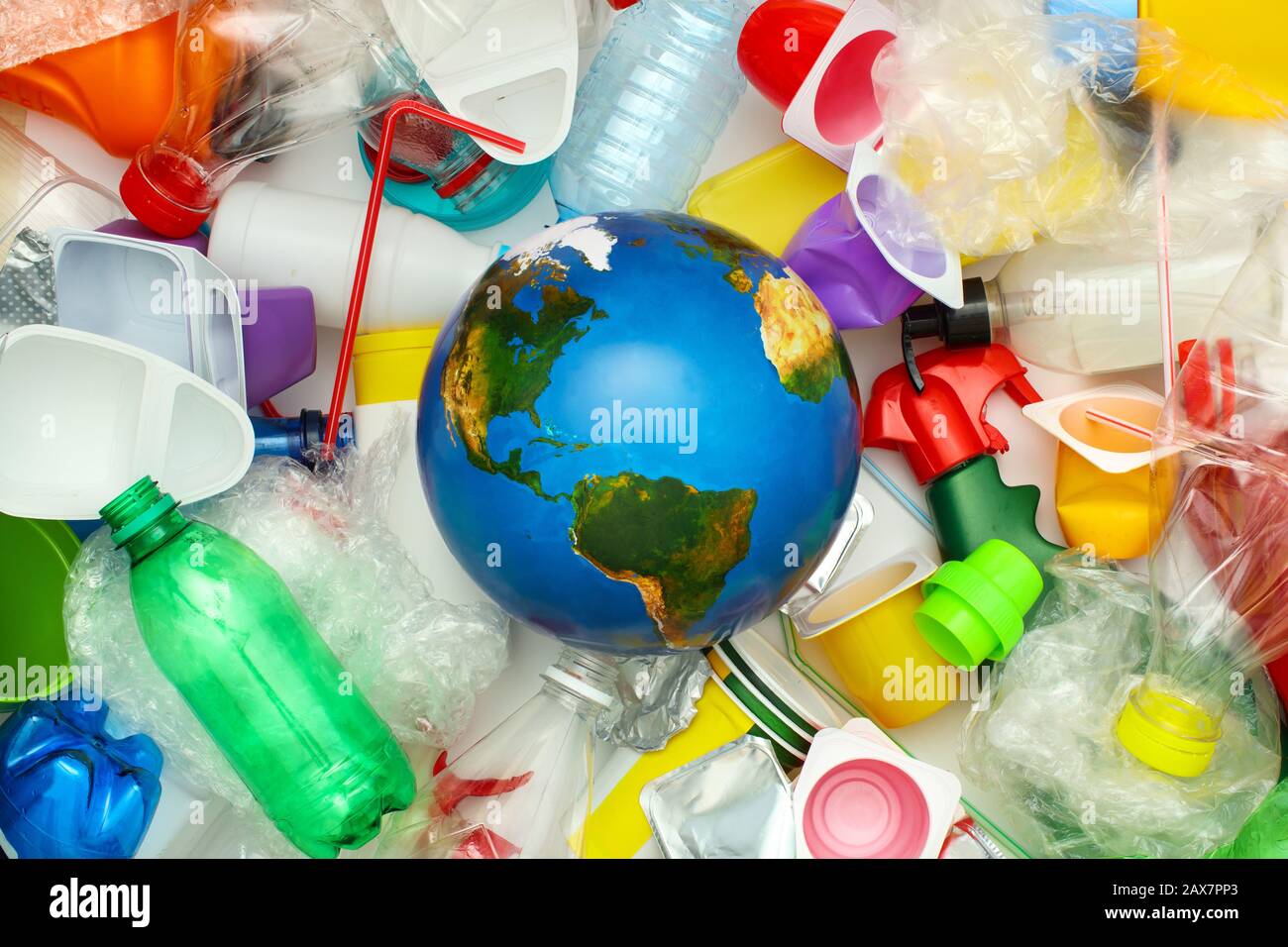 Global environmental pollution by plastic. Recycling concept Stock Photo