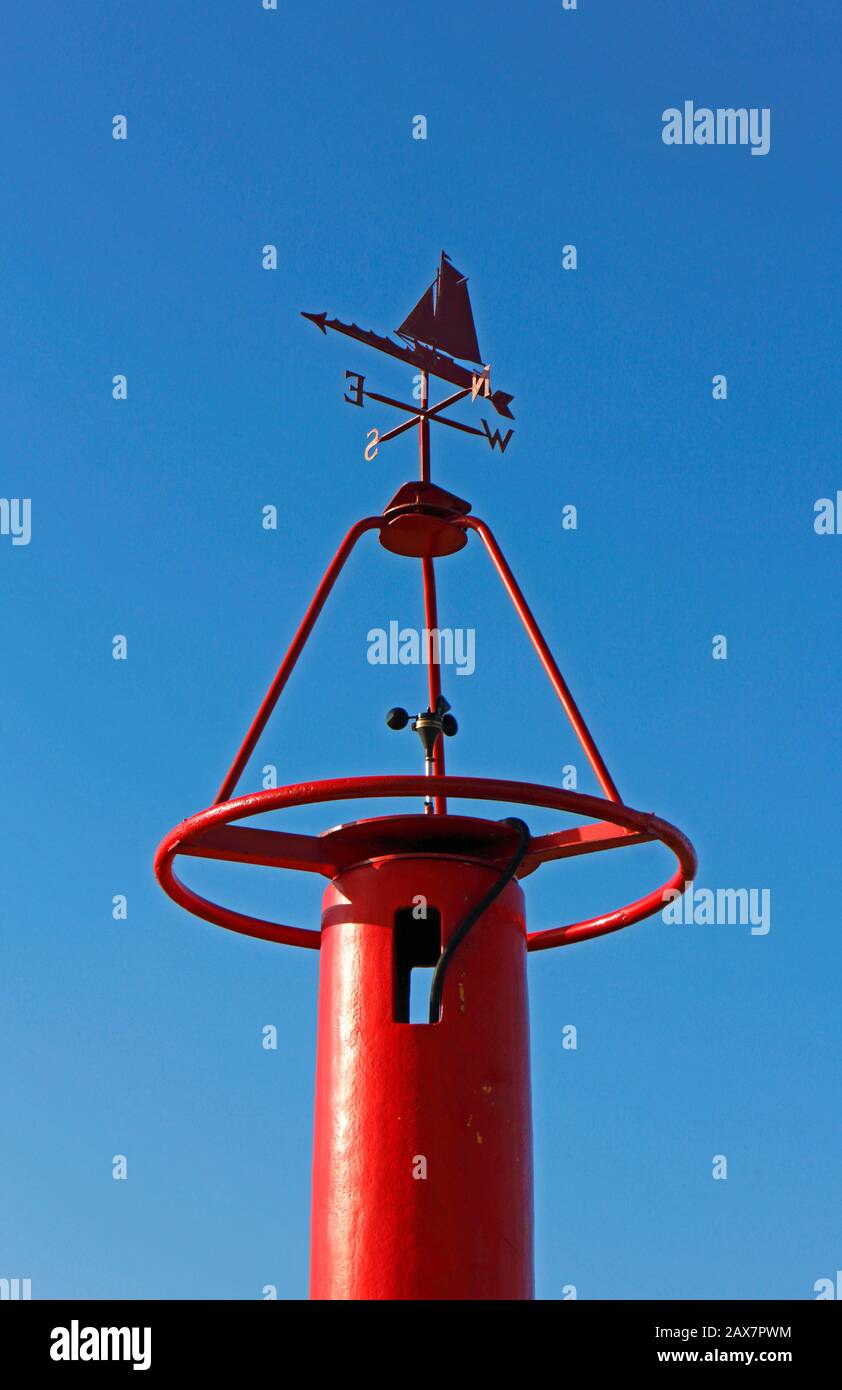 An anemometer and weather vane by the quay on the North Norfolk coast at Morston, Norfolk, England, United Kingdom, Europe. Stock Photo