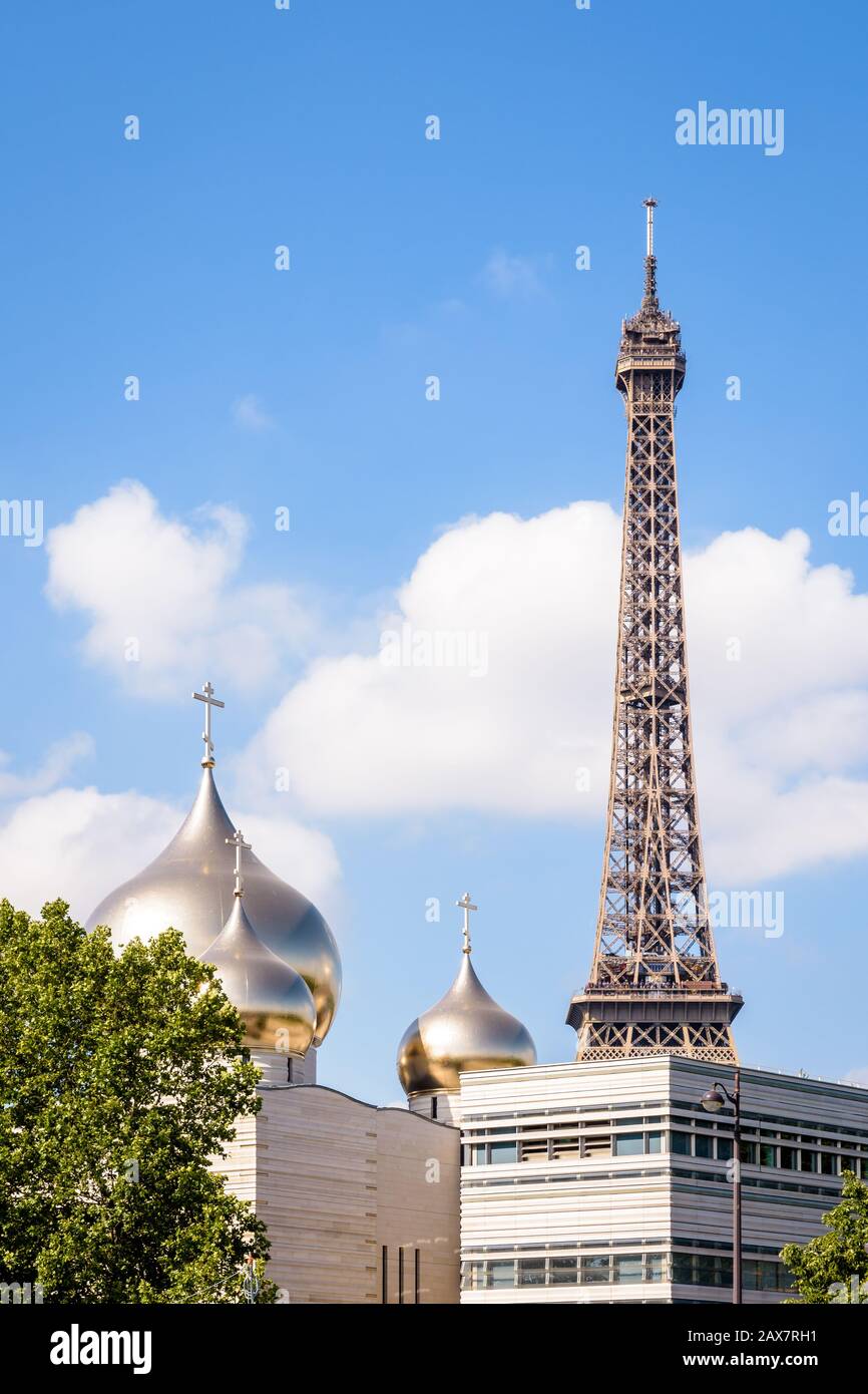 The Holy Trinity Cathedral is a russian orthodox cathedral topped by golden onion domes, built in 2016 not far from the Eiffel tower in Paris, France. Stock Photo