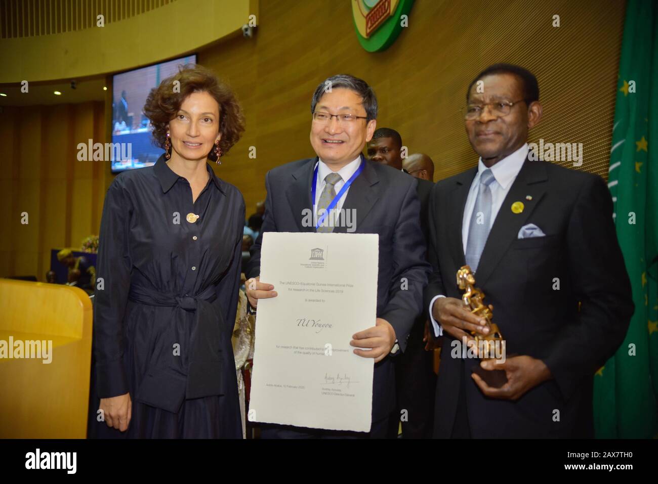 (200211) -- ADDIS ABABA, Feb. 11, 2020 (Xinhua) -- Liu Yuxi (C), head of the Chinese Mission to the AU, poses for photo with President of Equatorial Guinea Teodoro Obiang Nguema Mbasogo (R) and the Director-General of UNESCO Audrey Azoulay, after receiving the UNESCO-Equatorial Guinea International Prize for Research in the Life Sciences on behalf of Tu Youyou, in Addis Ababa, Ethiopia, Feb. 10, 2020. Chinese Nobel laureate Tu Youyou has been awarded the UNESCO-Equatorial Guinea International Prize for Research in the Life Sciences for her research into parasitic diseases. (Photo by Michael T Stock Photo