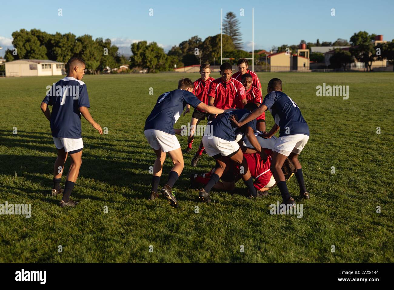 Rugby players playing rugby Stock Photo - Alamy