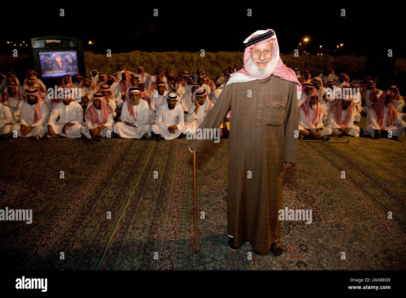 One of a hundred men that travel from all around the country to see His Royal Highness Prince  Al Waleed Bin Talal Al-Saud at his desert camp outside of Riyadh, Saudi Arabia. Stock Photo