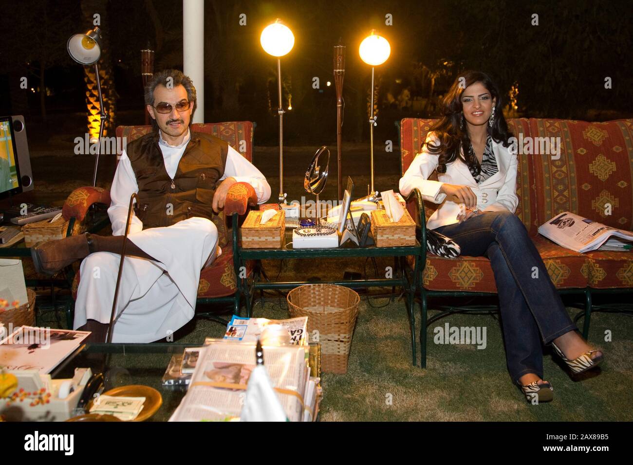 His Royal Highness Prince Al Waleed Bin Talal Al-Saud and Princess Ameerah enjoy a cool evening at his resort just outside Riyadh, Saudi Arabia. Stock Photo