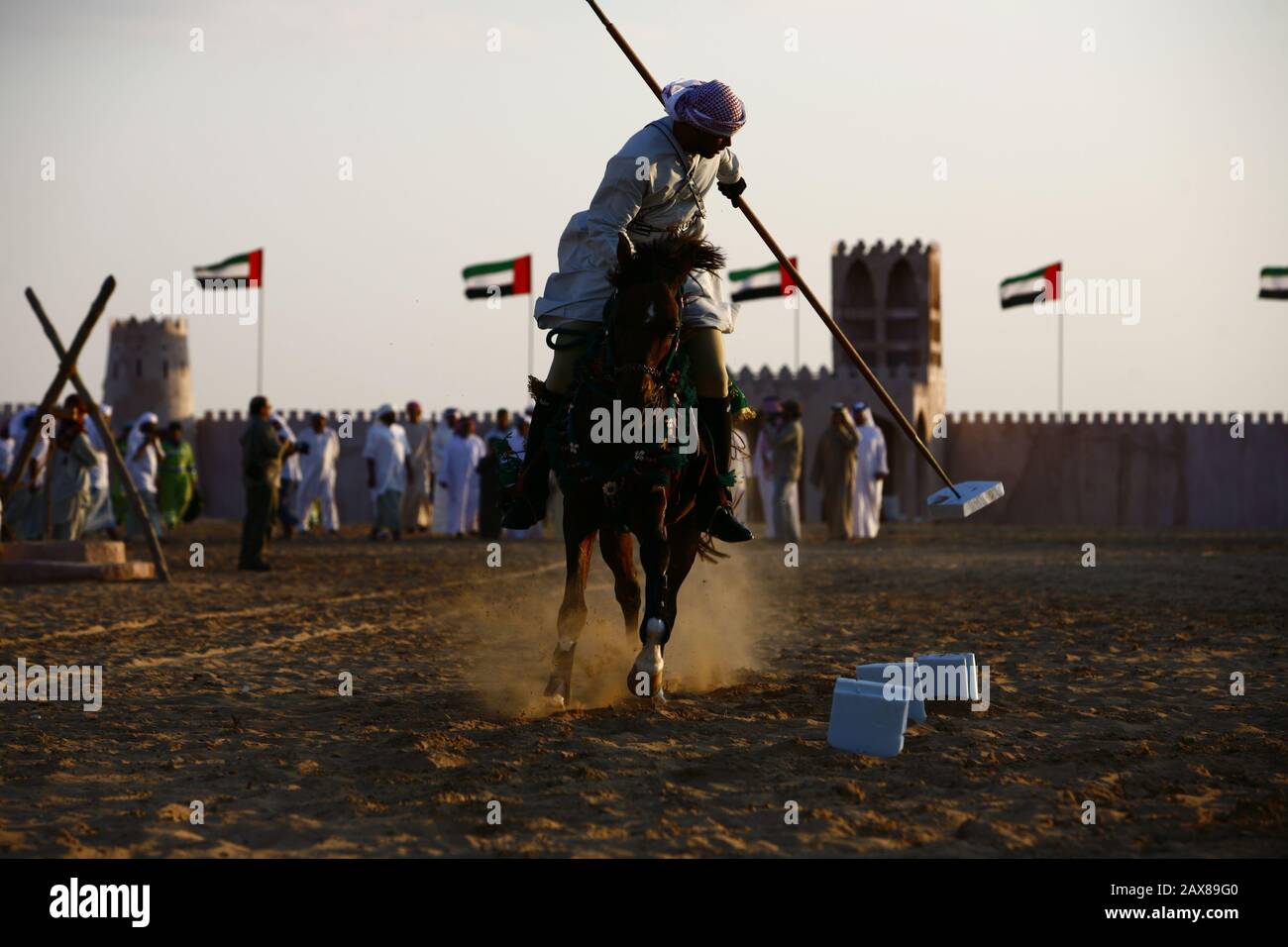 A traditional Emirati horse rider performs in Sweihan, UAE. Stock Photo