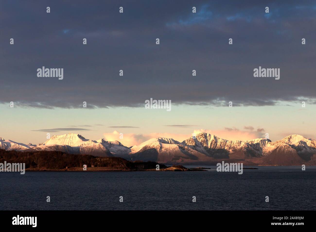 Mountain chain on the island of Hinnøya, Sortland, Nordland, Northern Norway, in early morning light Stock Photo