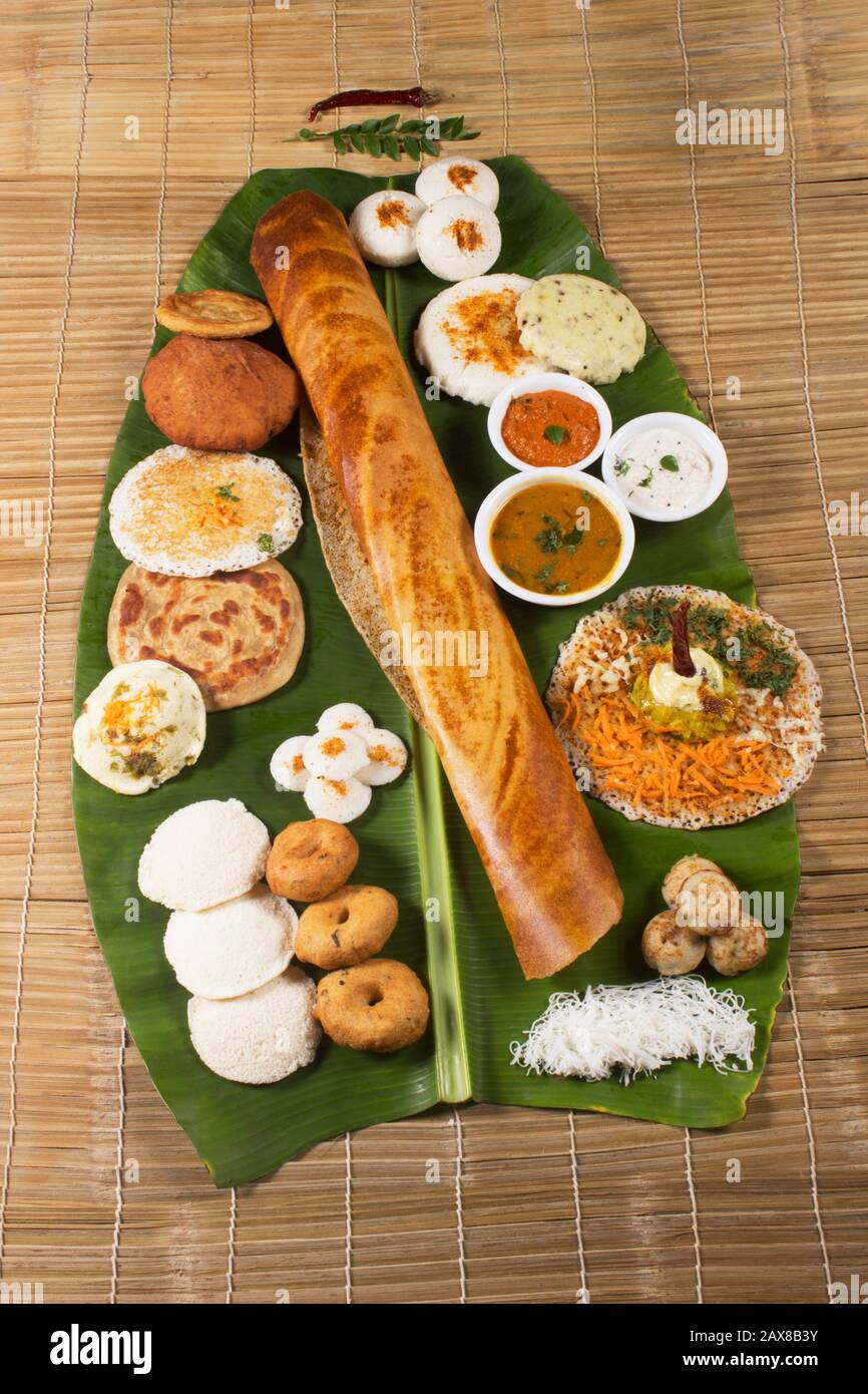 Traditional South Indian snacks, Dosa, idli, medu wada on banana leaf