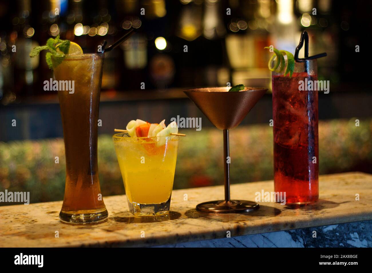 Cocktail Ranges Colour Different colored cocktails at a bar counter Stock Photo - Alamy