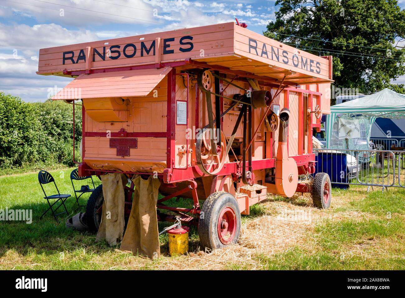 A 1950s Ransomes threshing machine restored and on display at Heddington Steam Fair and Courntry Show UK Stock Photo