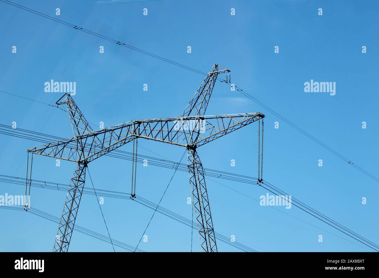 A pole of electrical networks and wires against blue sky Stock Photo ...