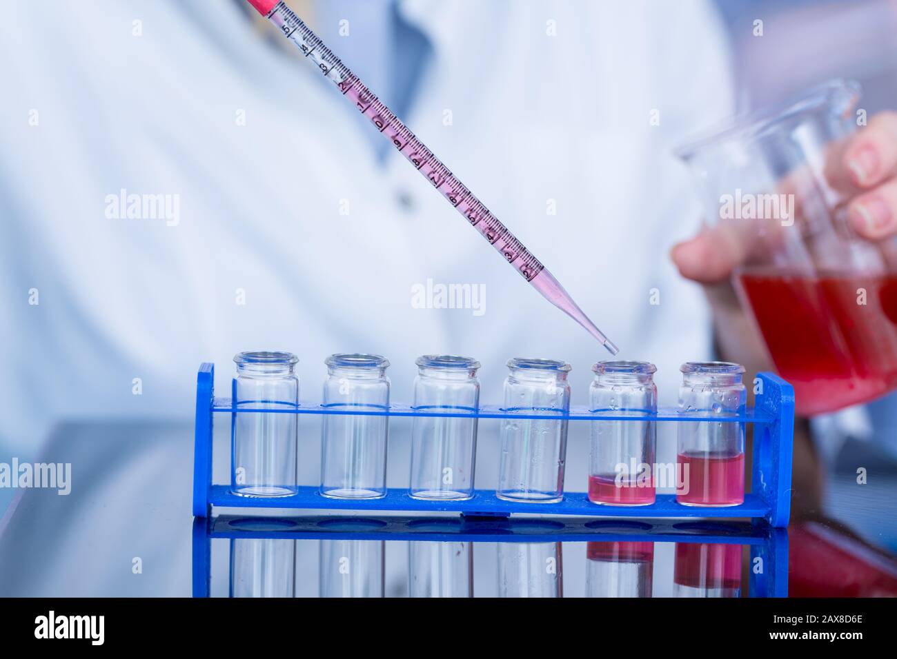 Using pipette in the laboratory Stock Photo Alamy