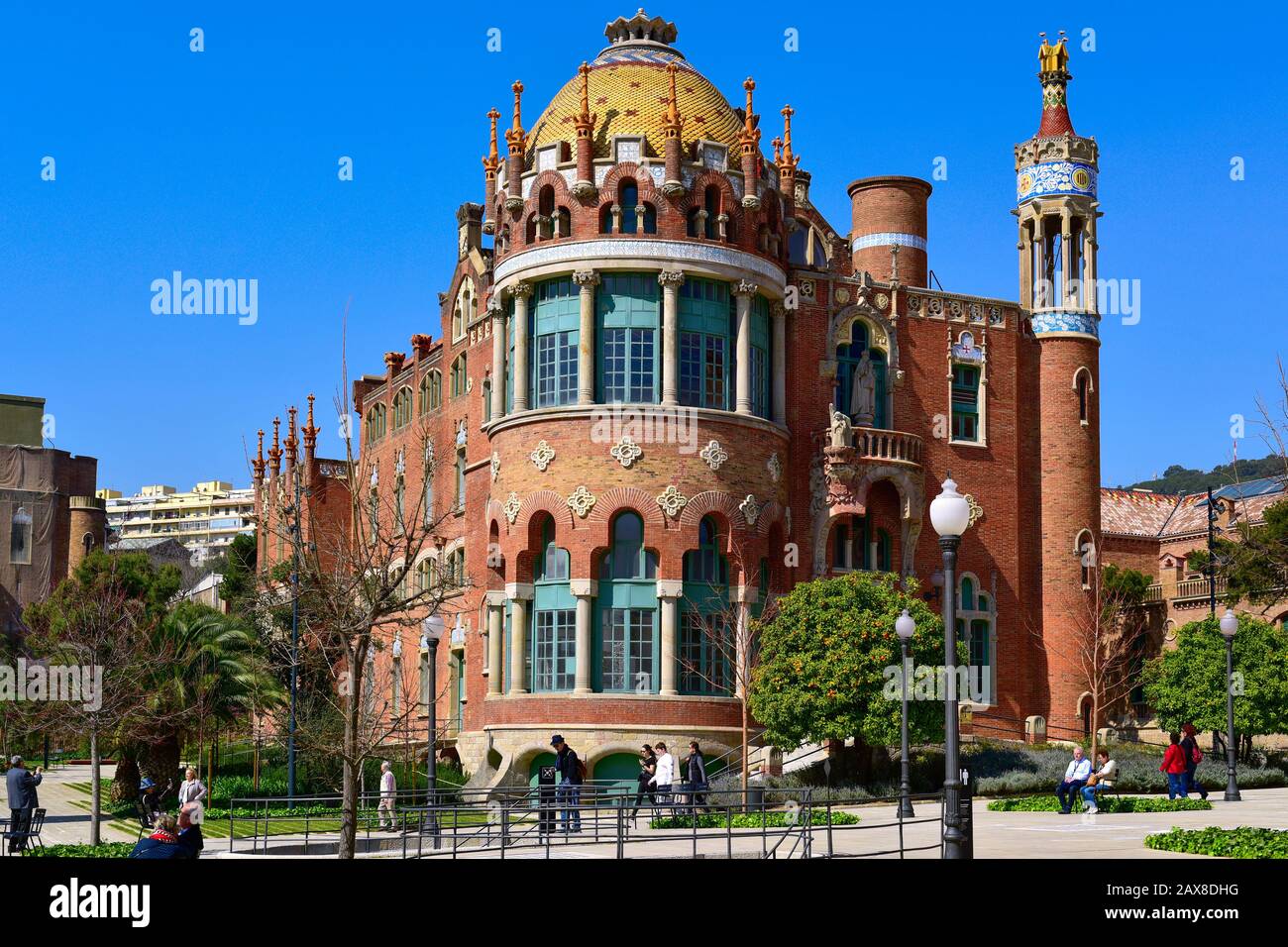 BARCELONA, SPAIN - MARCH 18, 2017: Visitors at the modernist complex of the Hospital de Sant Pau in Barcelona, Spain, which is part of the UNESCO Worl Stock Photo