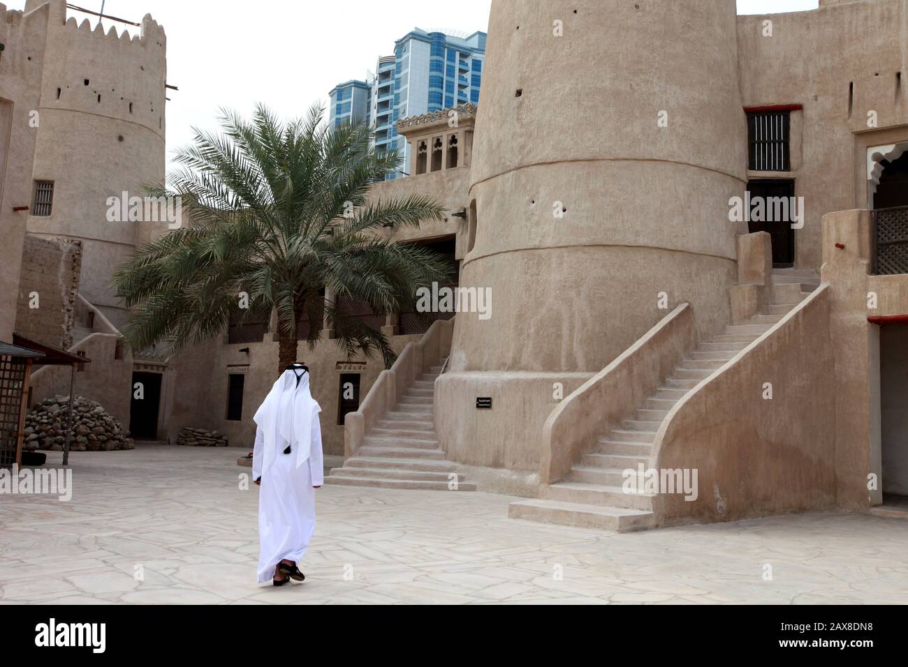 A man walks in the Ajman Fort. Ajman, UAE. Stock Photo