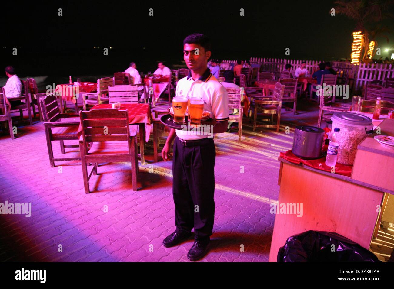 One of the servers holiday beach club, Ajman, UAE. Stock Photo